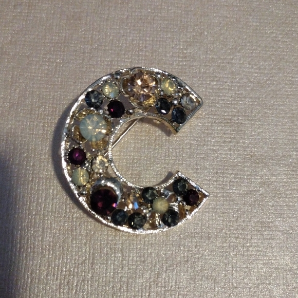 Jewelry - Elegant Silver and Gold Brooch with Gem Accents